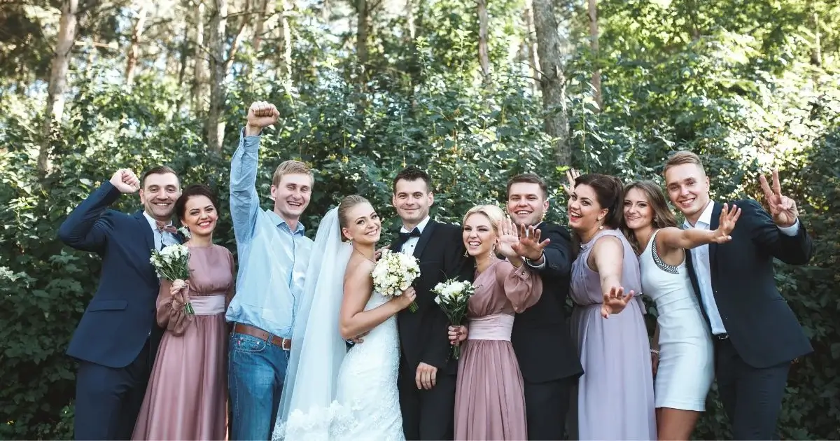 Wedding party celebrating outdoor ceremony